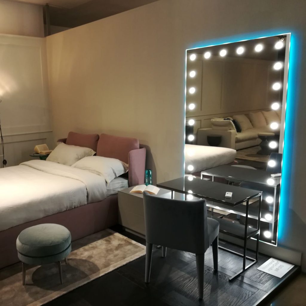backlit mirror Unica in bedroom