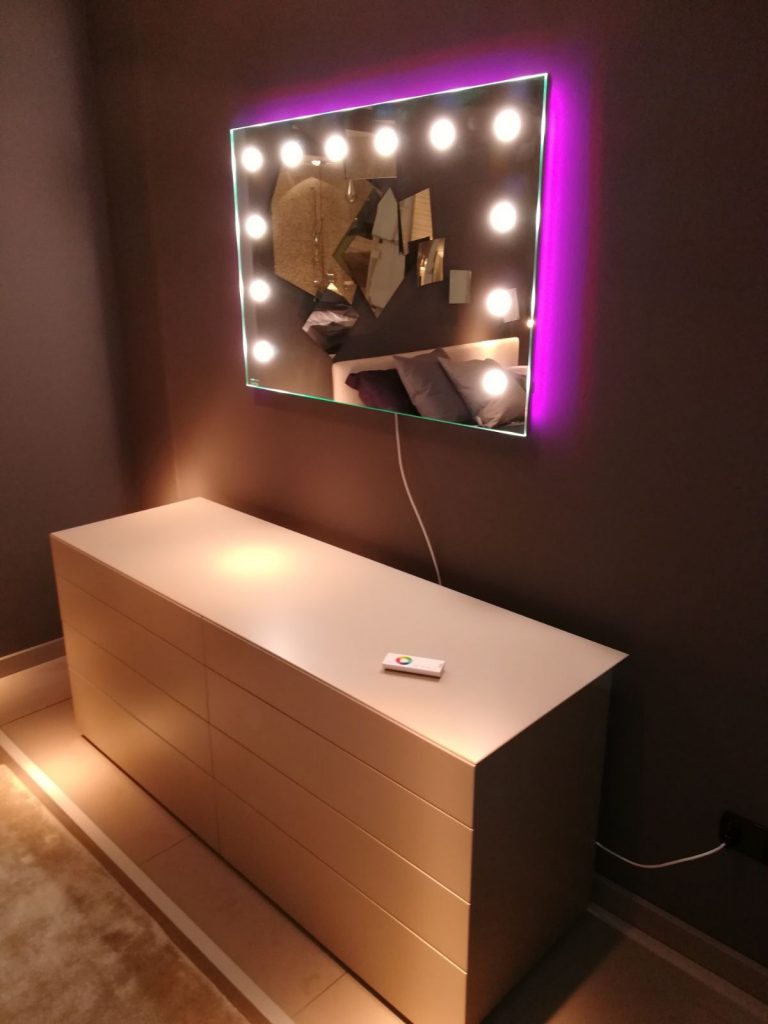 backlit mirror in bedroom